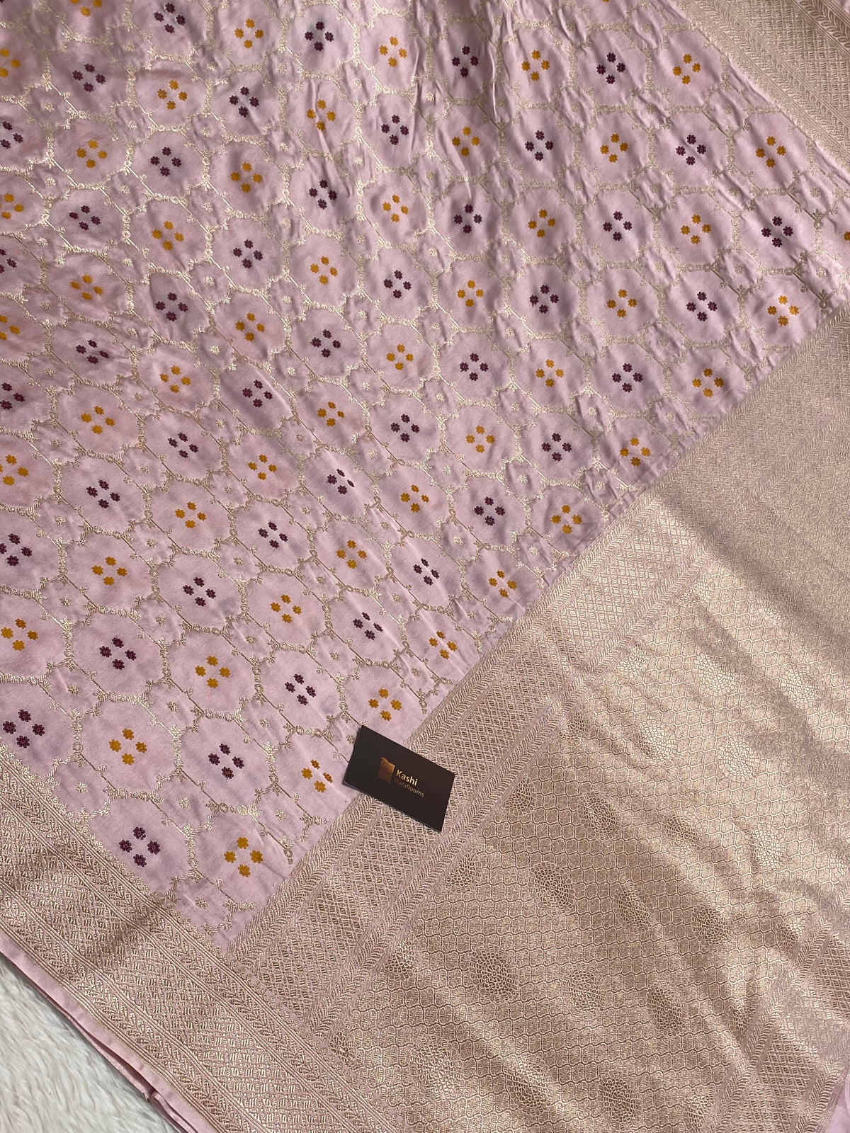 Light peach mashru silk banarasi saree with golden zari border