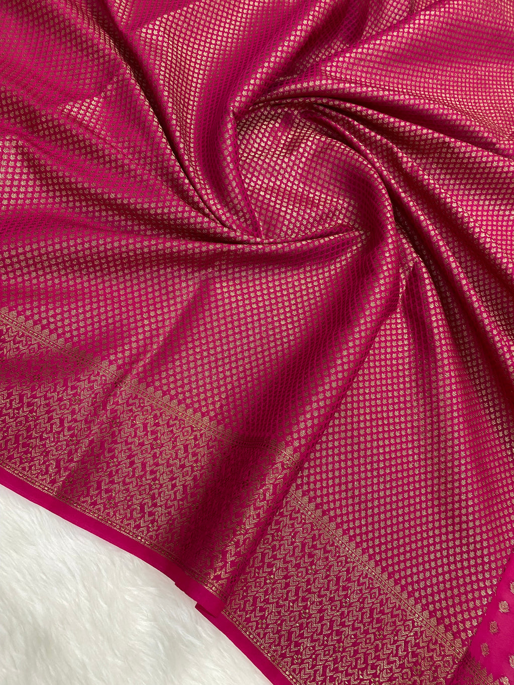 Rani Color Semi Georgette Banarasi Saree Barcode Border