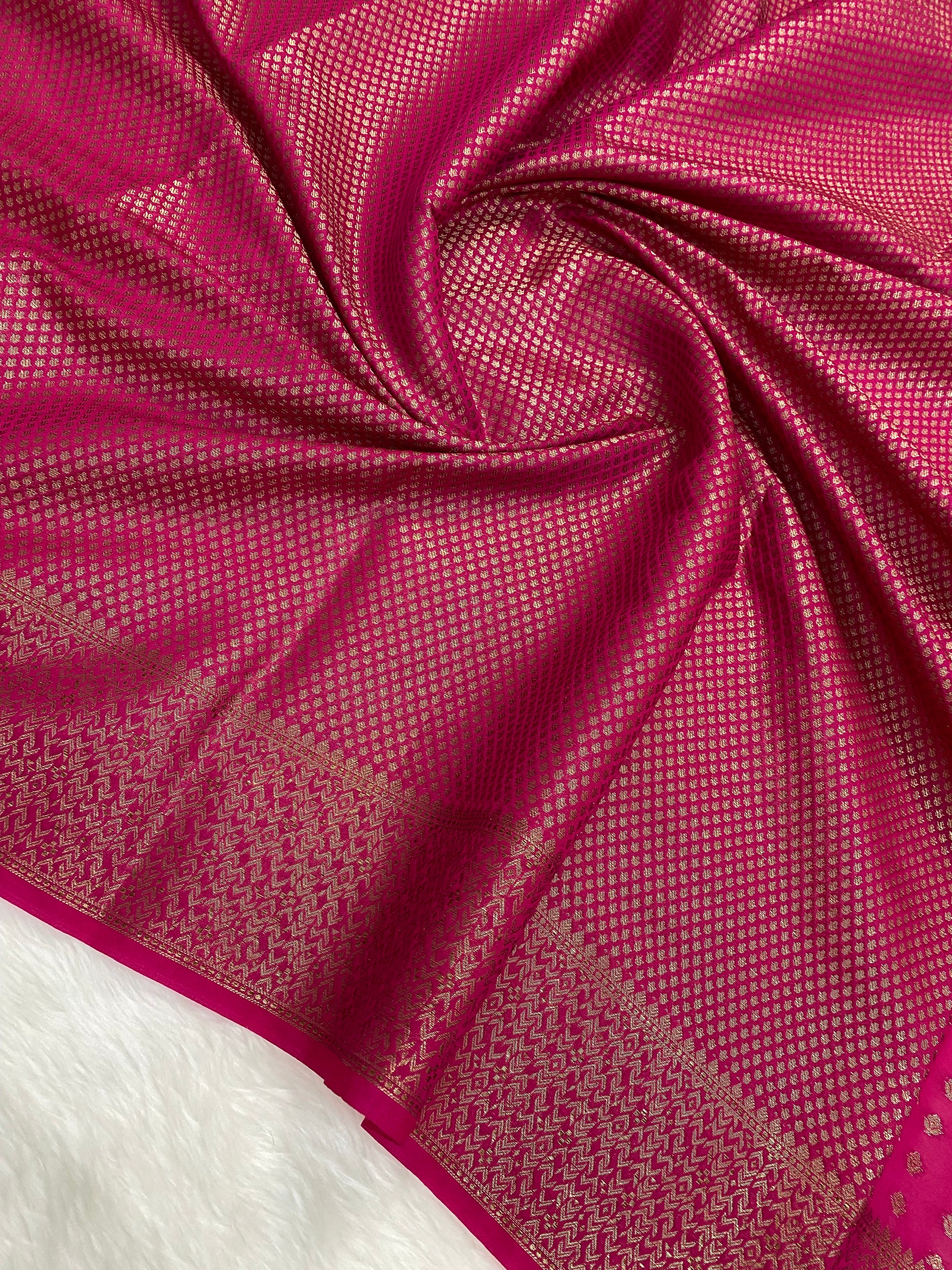 Rani Color Semi Georgette Banarasi Saree Barcode Border