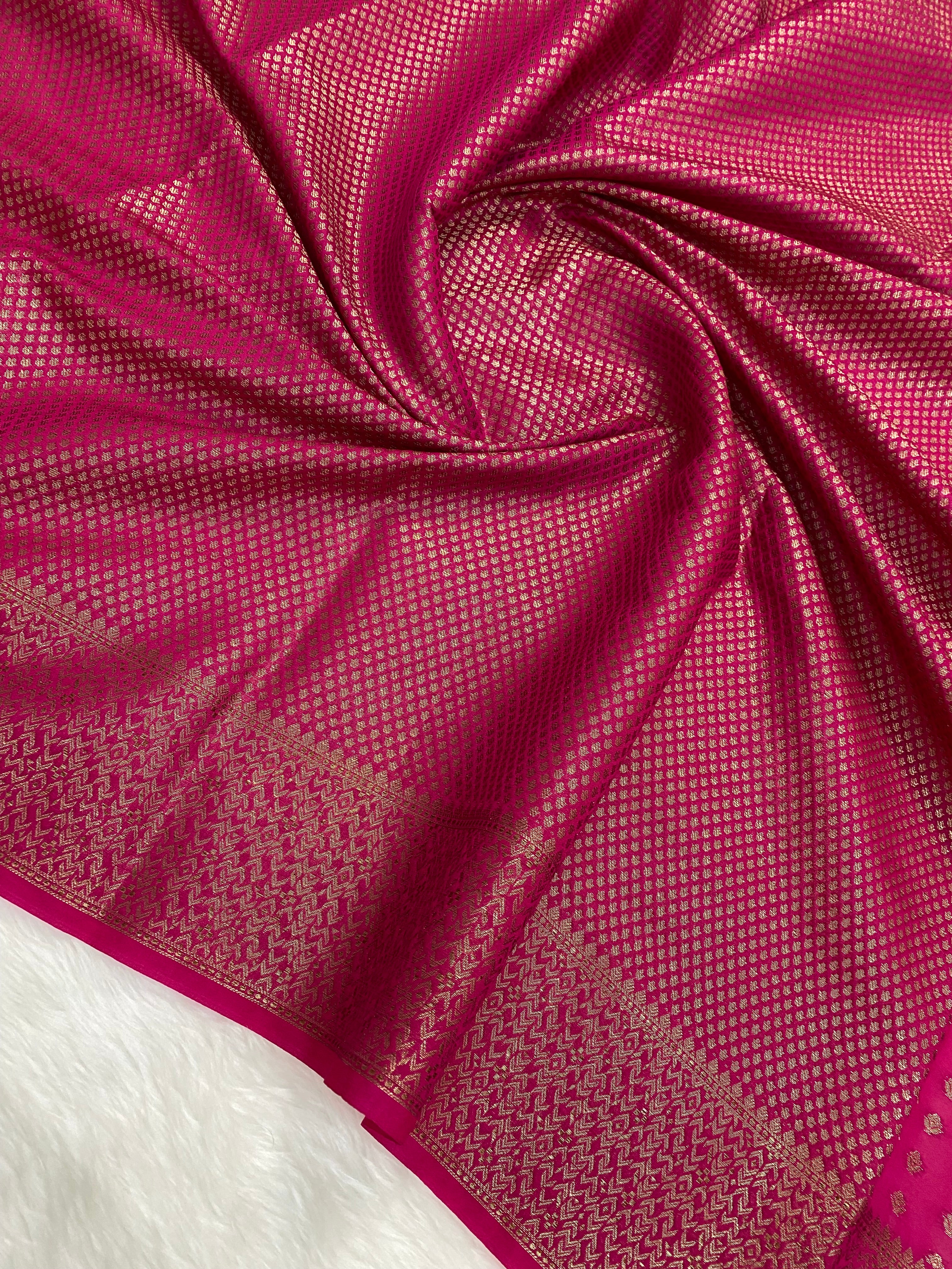 Rani Color Semi Georgette Banarasi Saree Barcode Border
