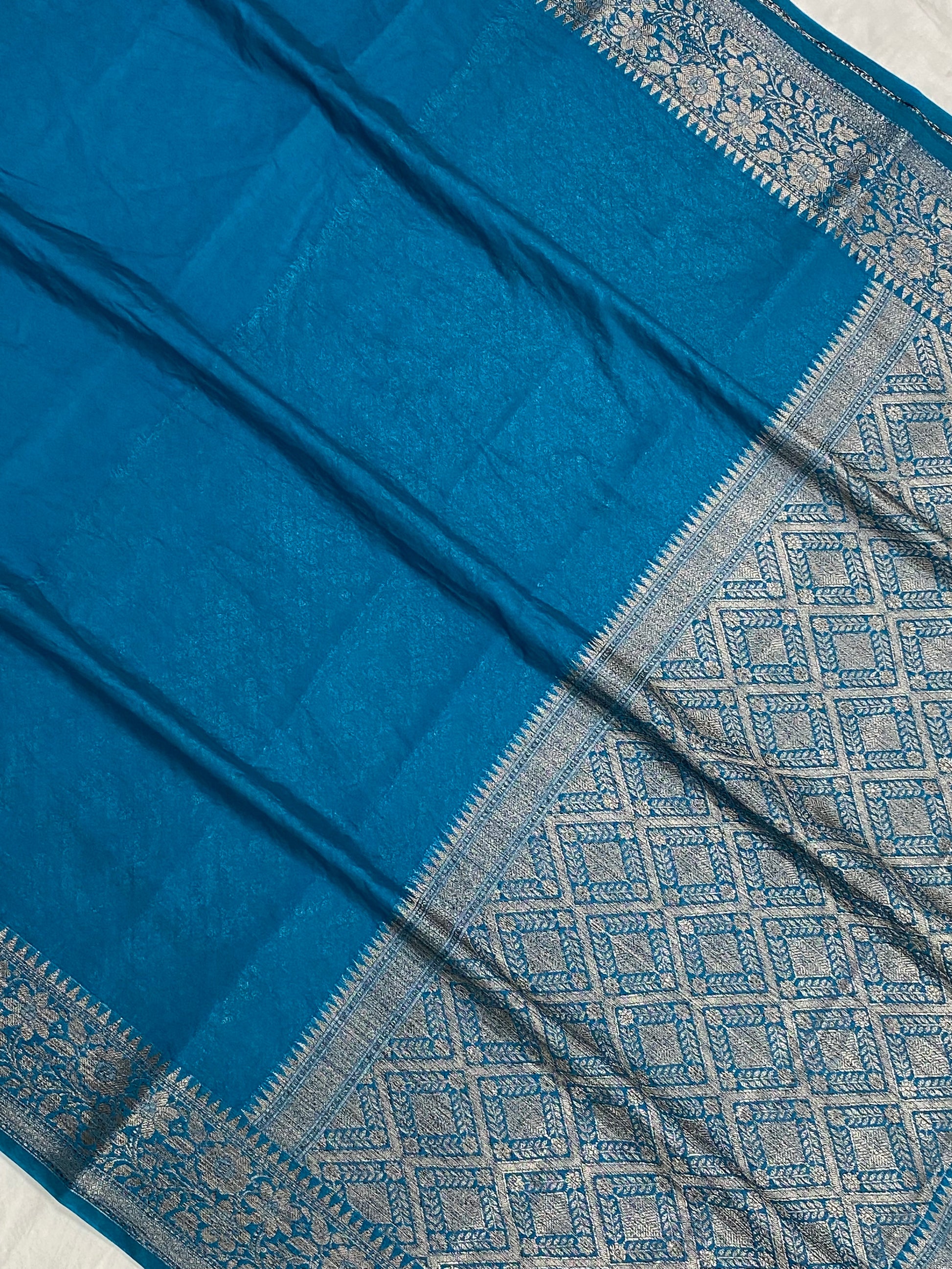 Teal Blue Georgette Saree with Antique Zari Border