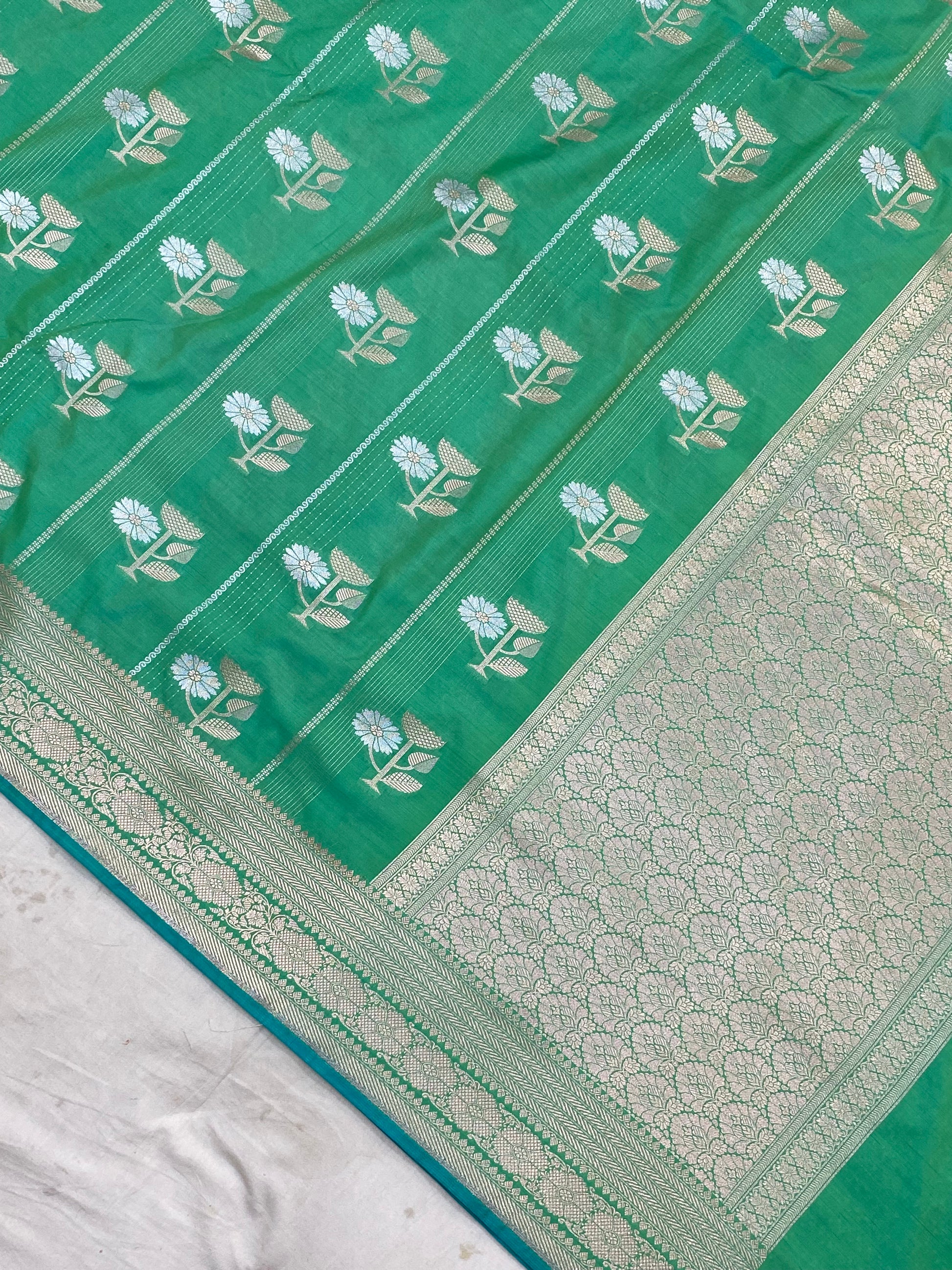 Elegant Green Banarasi Saree with Floral Zari Work