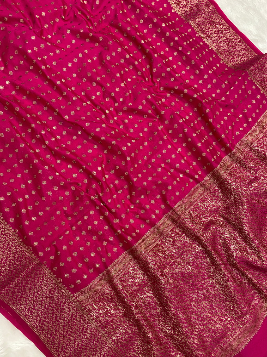 Rani Color Semi Georgette Banarasi Saree Barcode Border
