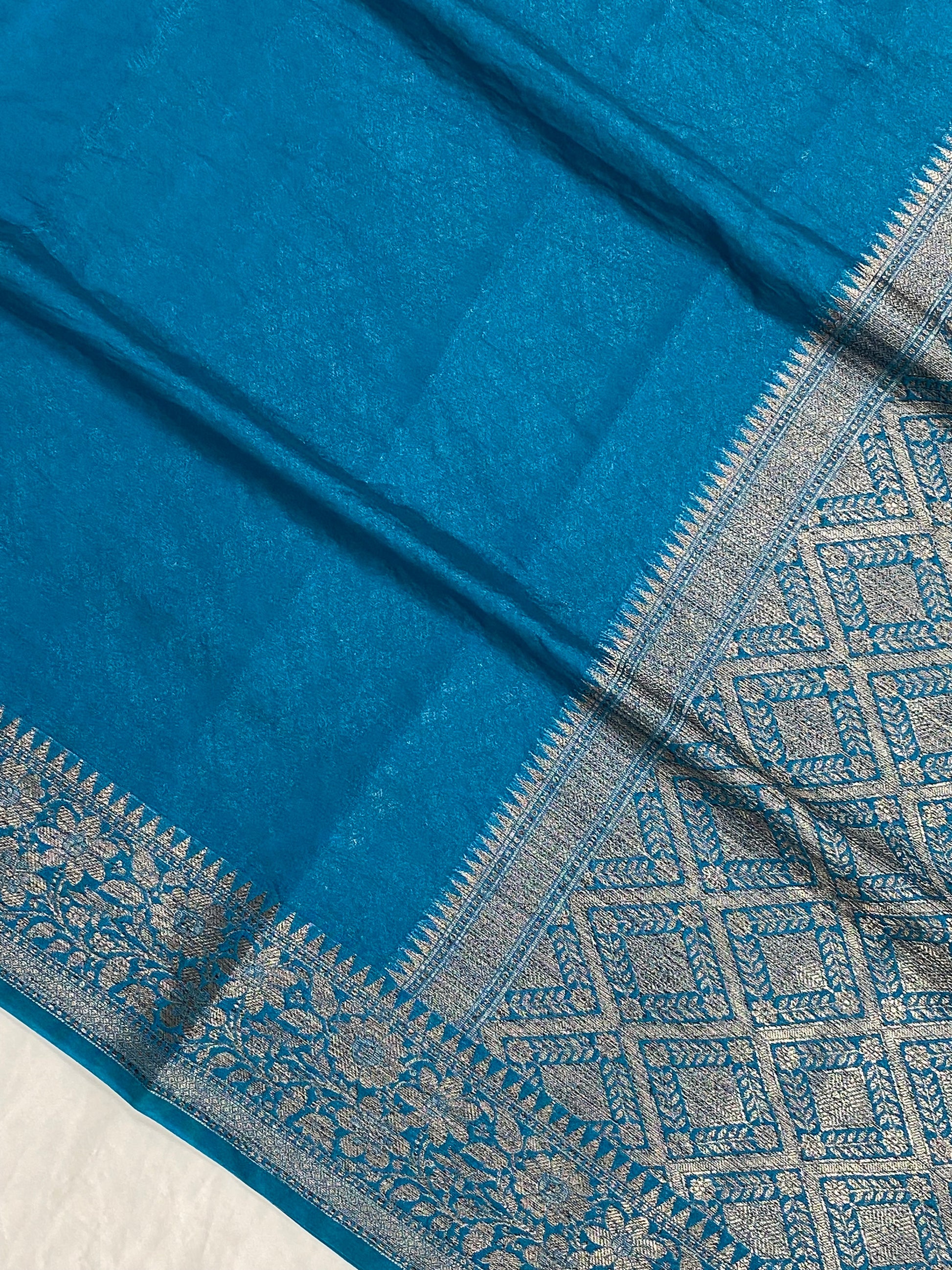Teal Blue Georgette Saree with Antique Zari Border