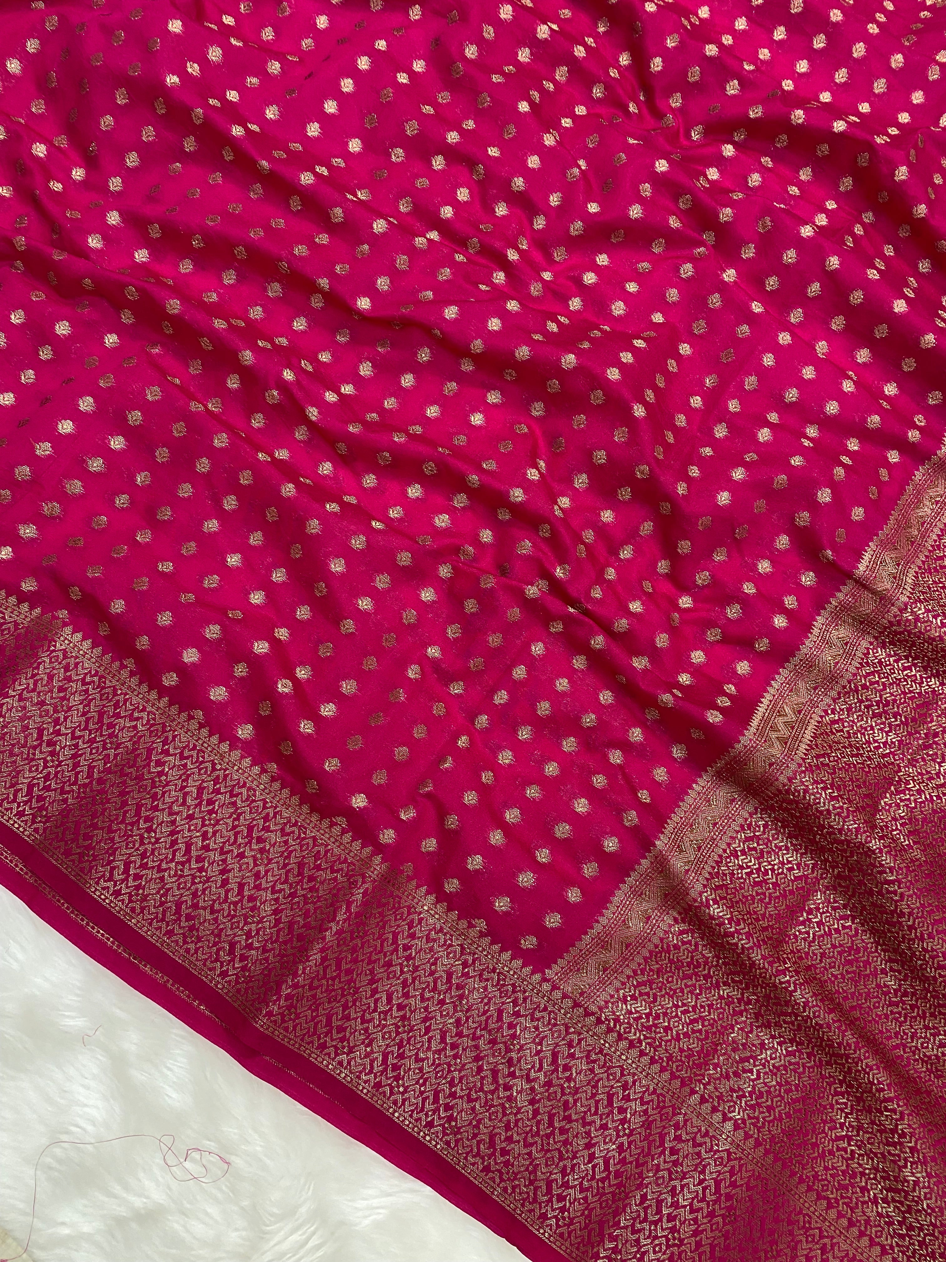 Rani Color Semi Georgette Banarasi Saree Barcode Border
