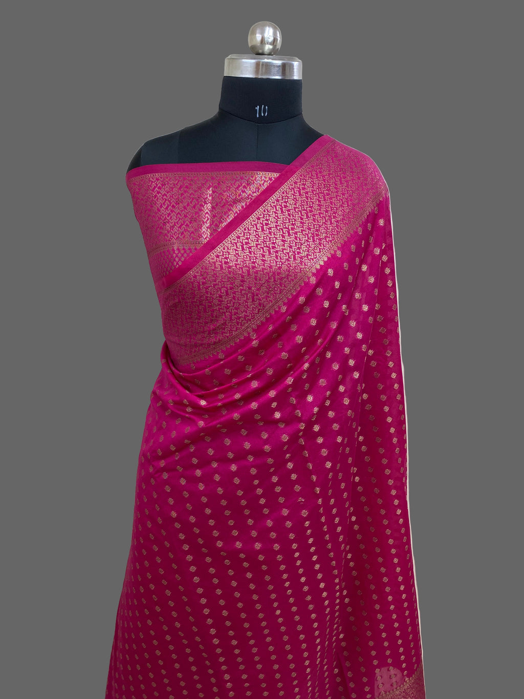 Rani Color Semi Georgette Banarasi Saree Barcode Border