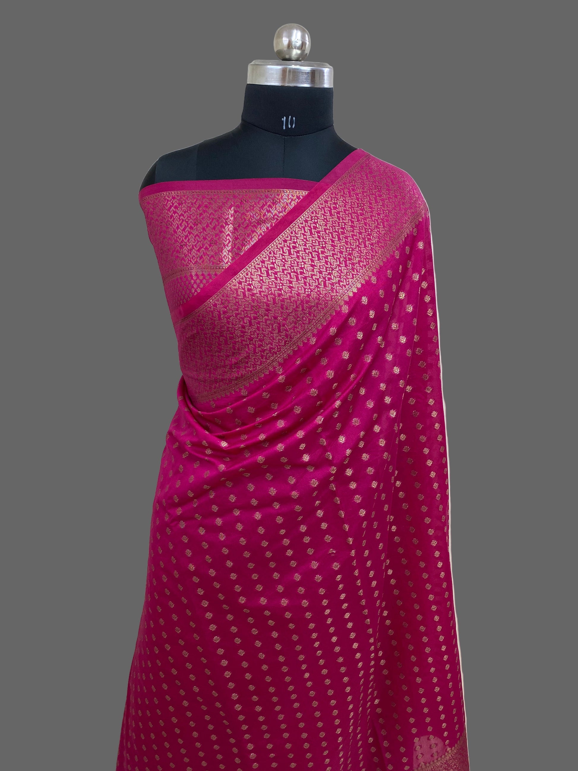 Rani Color Semi Georgette Banarasi Saree Barcode Border