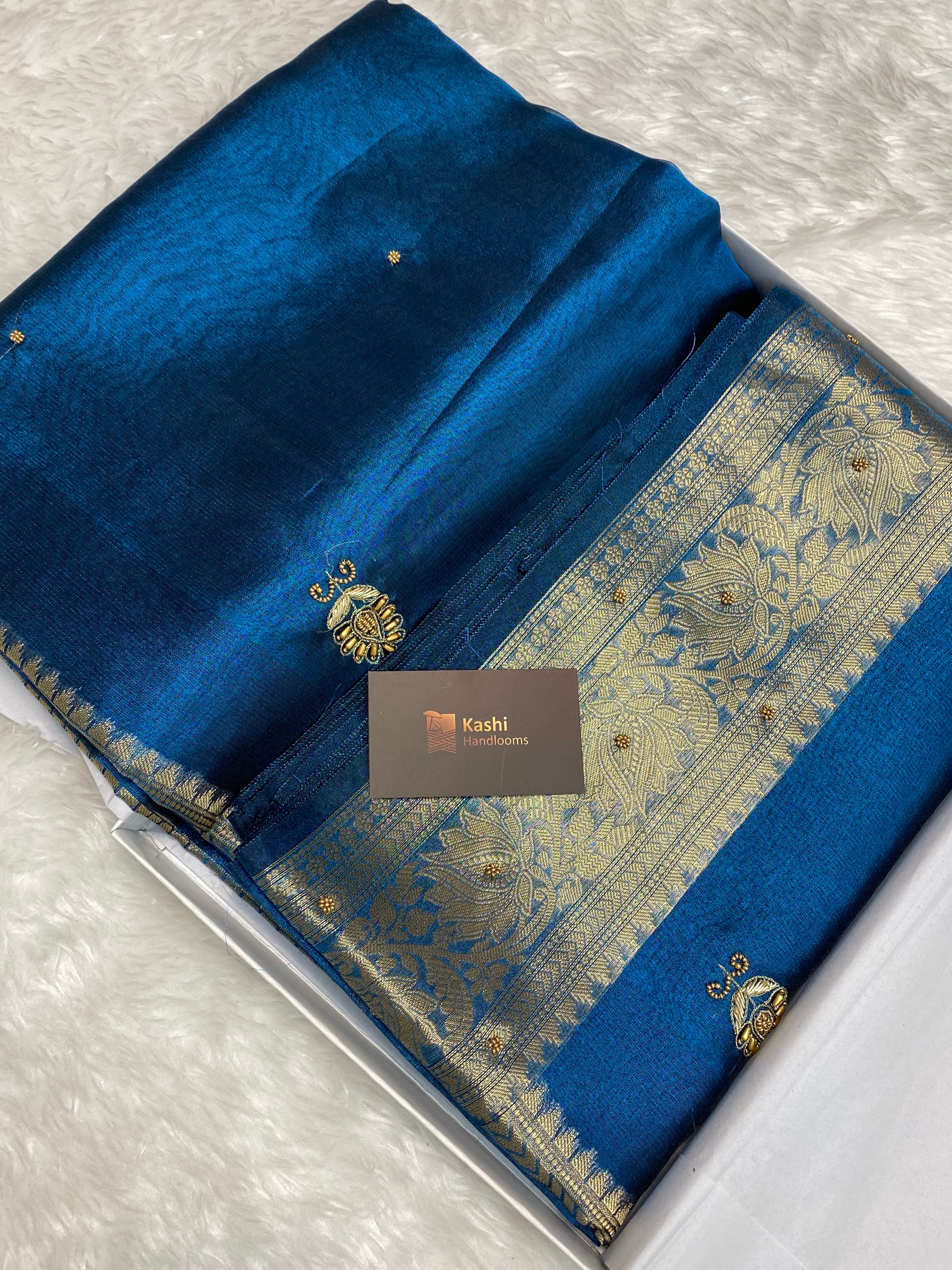 Premium blue colour Dhoop chaw tissue silk Banarasi saree with handwork