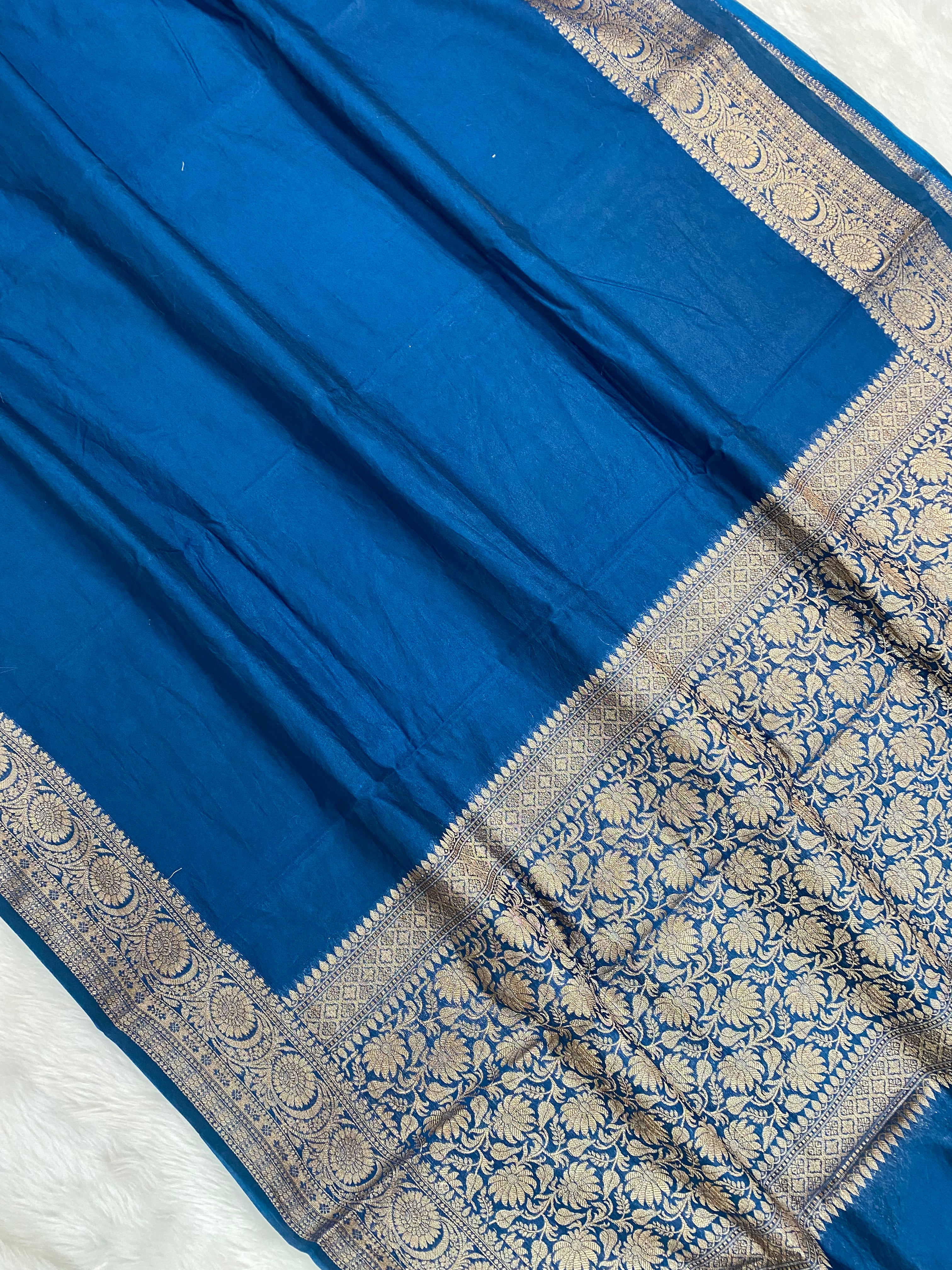 Teal Blue Georgette Saree with Antique Zari Border