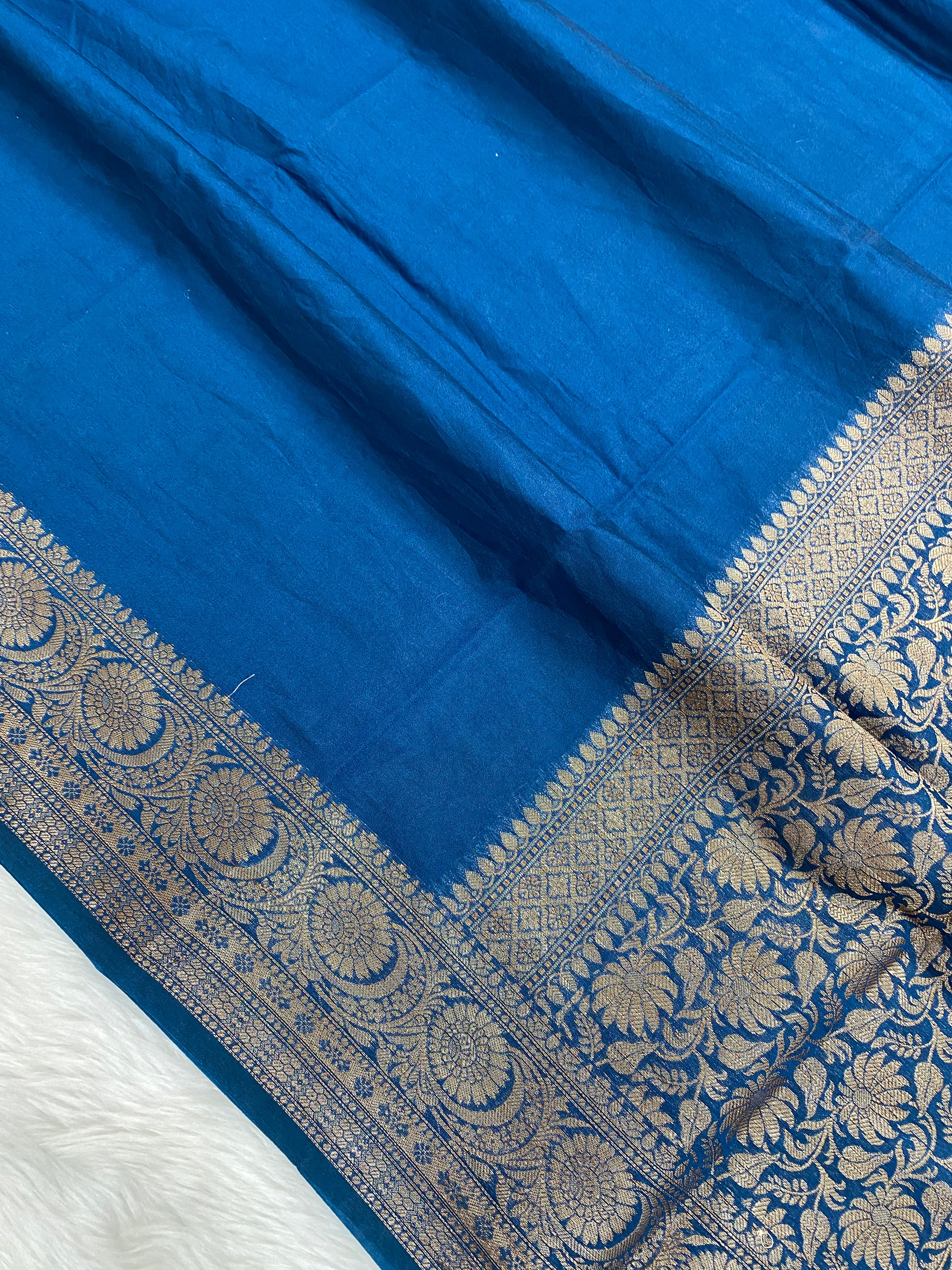 Teal Blue Georgette Saree with Antique Zari Border