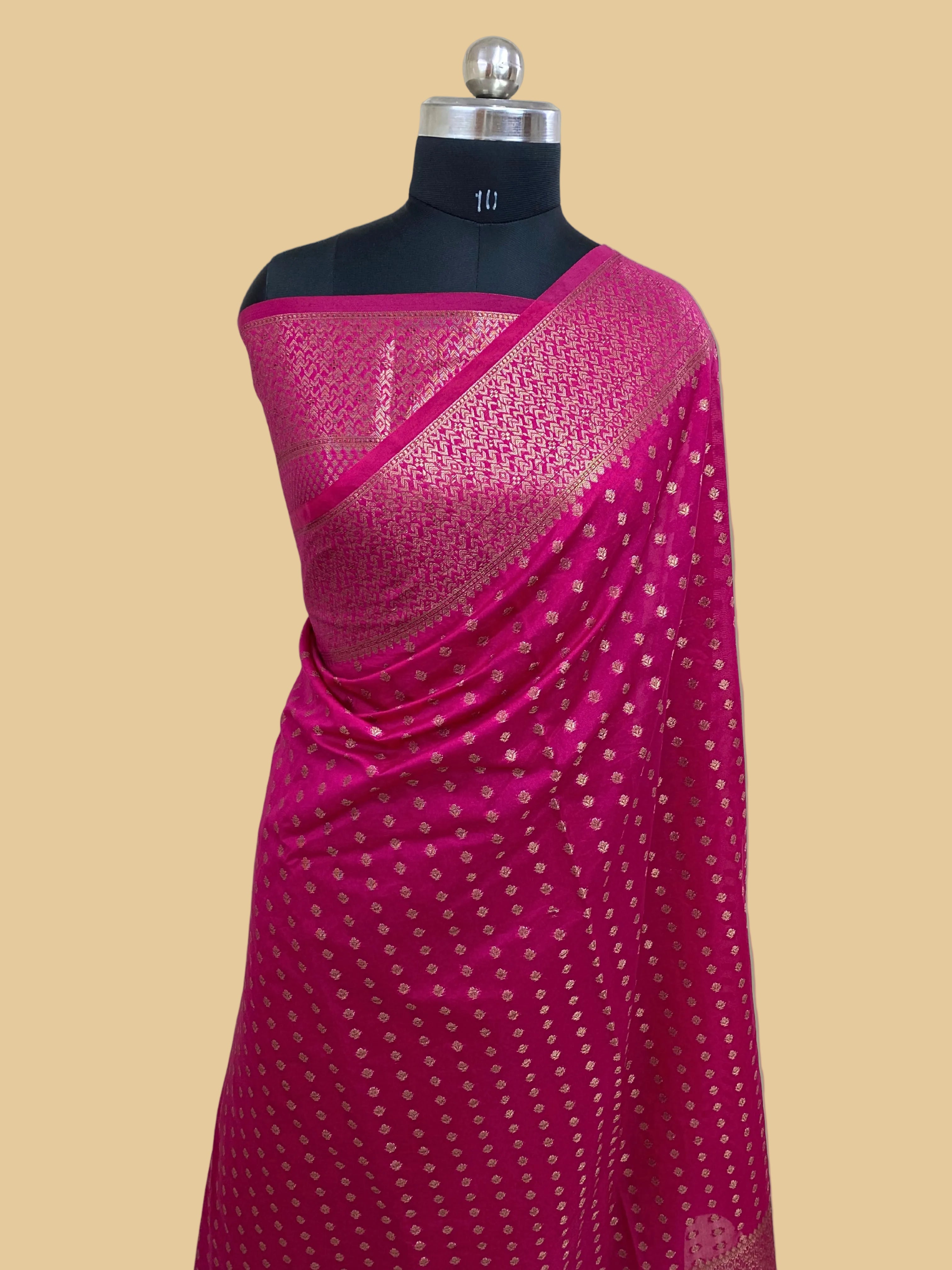 Rani Color Semi Georgette Banarasi Saree Barcode Border